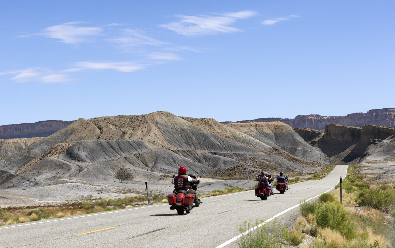 3 motorcycle riders on an open road